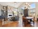 Bright living room with large windows, a modern fireplace, and stylish furnishings for comfortable living at 1913 Five Iron Dr, Castle Rock, CO 80104