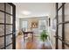 Bright home office featuring hardwood floors, natural light, and ample workspace at 1913 Five Iron Dr, Castle Rock, CO 80104