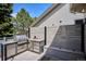Outdoor kitchen featuring grill, counter, and built-in bench at 1913 Five Iron Dr, Castle Rock, CO 80104