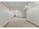 Unfinished basement with white walls and neutral carpet at 2838 S Heather Gardens Way # A, Aurora, CO 80014