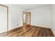 Bright bedroom showcasing wood floors and neutral paint at 2838 S Heather Gardens Way # A, Aurora, CO 80014
