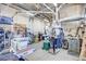 Well-equipped workshop featuring various tools, machinery, and storage solutions for DIY projects and hobbies at 2838 S Heather Gardens Way # A, Aurora, CO 80014