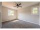 Bright and airy bedroom with neutral tones, plush carpeting and natural light at 1248 Ilium Dr, Lafayette, CO 80026