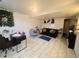 Spacious basement area featuring neutral paint, tile floors, and plenty of room for activities at 5411 Chandler Way, Denver, CO 80239