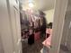 Organized walk-in closet offering ample storage space for clothes and accessories at 5411 Chandler Way, Denver, CO 80239