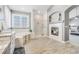 Spa-like bathroom with soaking tub, fireplace, and walk-in shower at 7285 Sagebrush Dr, Parker, CO 80138