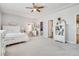 Charming bedroom with white furniture and ample closet space at 7285 Sagebrush Dr, Parker, CO 80138