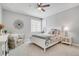Comfortable bedroom with window seat and a double bed at 7285 Sagebrush Dr, Parker, CO 80138
