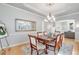 Formal dining room showcasing a wood table and charming decor at 7285 Sagebrush Dr, Parker, CO 80138
