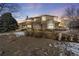 Two-story house with stone accents and a large front yard at 7285 Sagebrush Dr, Parker, CO 80138