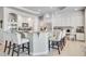 Spacious kitchen with a large island and built-in workspace at 7285 Sagebrush Dr, Parker, CO 80138