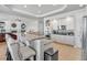 Large kitchen with an island, stainless steel appliances and breakfast bar at 7285 Sagebrush Dr, Parker, CO 80138