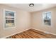 Bright bedroom with hardwood floors and windows at 1200 Newark St, Aurora, CO 80010