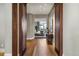 Hallway featuring hardwood floors with view of the main bedroom at 2800 E 2Nd Ave # 202, Denver, CO 80206