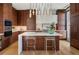 Bright, modern kitchen with island seating and stainless steel appliances at 2800 E 2Nd Ave # 202, Denver, CO 80206