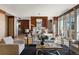 Bright living room with wood accents, modern furniture, and fireplace at 2800 E 2Nd Ave # 202, Denver, CO 80206
