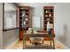 Cozy office space with built-in shelving and a stylish desk at 2800 E 2Nd Ave # 202, Denver, CO 80206