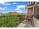 Enjoy views from this outdoor balcony with seating, perfect for relaxing and entertaining at 1000 Elmhurst Dr # B, Highlands Ranch, CO 80129