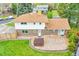 An aerial view of the house highlighting the backyard, patio, and hot tub at 7076 S Spruce W Dr, Centennial, CO 80112