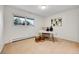 Bedroom with a desk, chair, vases, a large window, and carpeted flooring at 7076 S Spruce W Dr, Centennial, CO 80112