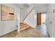 Inviting entryway with tiled flooring and a staircase leading to the upper level at 7076 S Spruce W Dr, Centennial, CO 80112