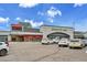 Sprouts and Molly's Spirits exterior with ample parking at 7076 S Spruce W Dr, Centennial, CO 80112