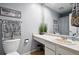 Clean bathroom featuring a neutral color scheme and decorative accents at 13228 E Asbury Dr, Aurora, CO 80014