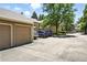 Two garages are shown, with cars parked in the parking lot at 13228 E Asbury Dr, Aurora, CO 80014