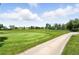 Scenic view of the community golf course on a sunny day at 13228 E Asbury Dr, Aurora, CO 80014