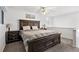Spacious main bedroom featuring a large bed and bedside tables at 13228 E Asbury Dr, Aurora, CO 80014