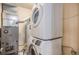 Practical laundry area featuring a stacked washer and dryer at 3593 S Kittredge St # E, Aurora, CO 80013
