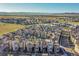 Aerial view of a new modern home community with mountain views at 2615 Mayotte Way, Castle Rock, CO 80109