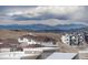 Community overview showcasing mountain views and homes at 2615 Mayotte Way, Castle Rock, CO 80109