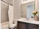 Bathroom with tub, toilet, vanity, and shower at 2615 Mayotte Way, Castle Rock, CO 80109