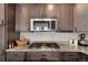 Granite countertops and stainless steel appliances in this kitchen at 2615 Mayotte Way, Castle Rock, CO 80109