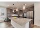 Modern kitchen with stainless steel appliances and granite countertops at 2615 Mayotte Way, Castle Rock, CO 80109