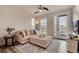 Modern living room with access to balcony and stylish furniture at 2615 Mayotte Way, Castle Rock, CO 80109