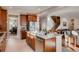 Modern kitchen with stainless steel appliances, granite countertops, and an open concept layout at 10480 Skyreach Rd, Highlands Ranch, CO 80126