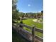 Well-manicured backyard with a wooden fence and a variety of mature landscaping and plantings at 16706 E Black Horn Dr, Parker, CO 80134