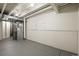 Utility area, with mechanical, painted floors and walls, and access to stairs at 16706 E Black Horn Dr, Parker, CO 80134
