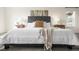 Comfortable main bedroom with a plush bed, neutral decor, and ample natural light at 16706 E Black Horn Dr, Parker, CO 80134