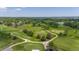 Expansive golf course view with lush greenery, sand traps, and winding cart paths at 645 Flintwood Place, Lafayette, CO 80026
