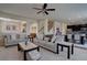 Spacious living room showcasing comfortable seating, open layout, and stylish decor at 3164 S Kirk Way, Aurora, CO 80013