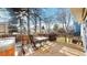 Outdoor deck with dining table, chairs, and grill, perfect for outdoor entertaining at 17588 E Dickenson Pl, Aurora, CO 80013
