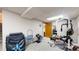 Basement gym featuring workout equipment and ample space at 17588 E Dickenson Pl, Aurora, CO 80013