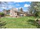 Spacious backyard featuring a patio area with seating, perfect for outdoor entertaining and relaxation in a serene setting at 4626 E Links Dr, Centennial, CO 80122