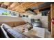 Finished basement offering a large sectional couch, television, and bright recessed lighting at 4626 E Links Dr, Centennial, CO 80122