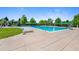 Large community pool with plenty of seating provides residents with a refreshing recreational space at 4626 E Links Dr, Centennial, CO 80122