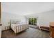 Spacious main bedroom with a large window and bench seating providing plenty of natural light at 4626 E Links Dr, Centennial, CO 80122