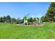 Community playground with slides and equipment, perfect for children to play and enjoy outdoor activities at 4626 E Links Dr, Centennial, CO 80122